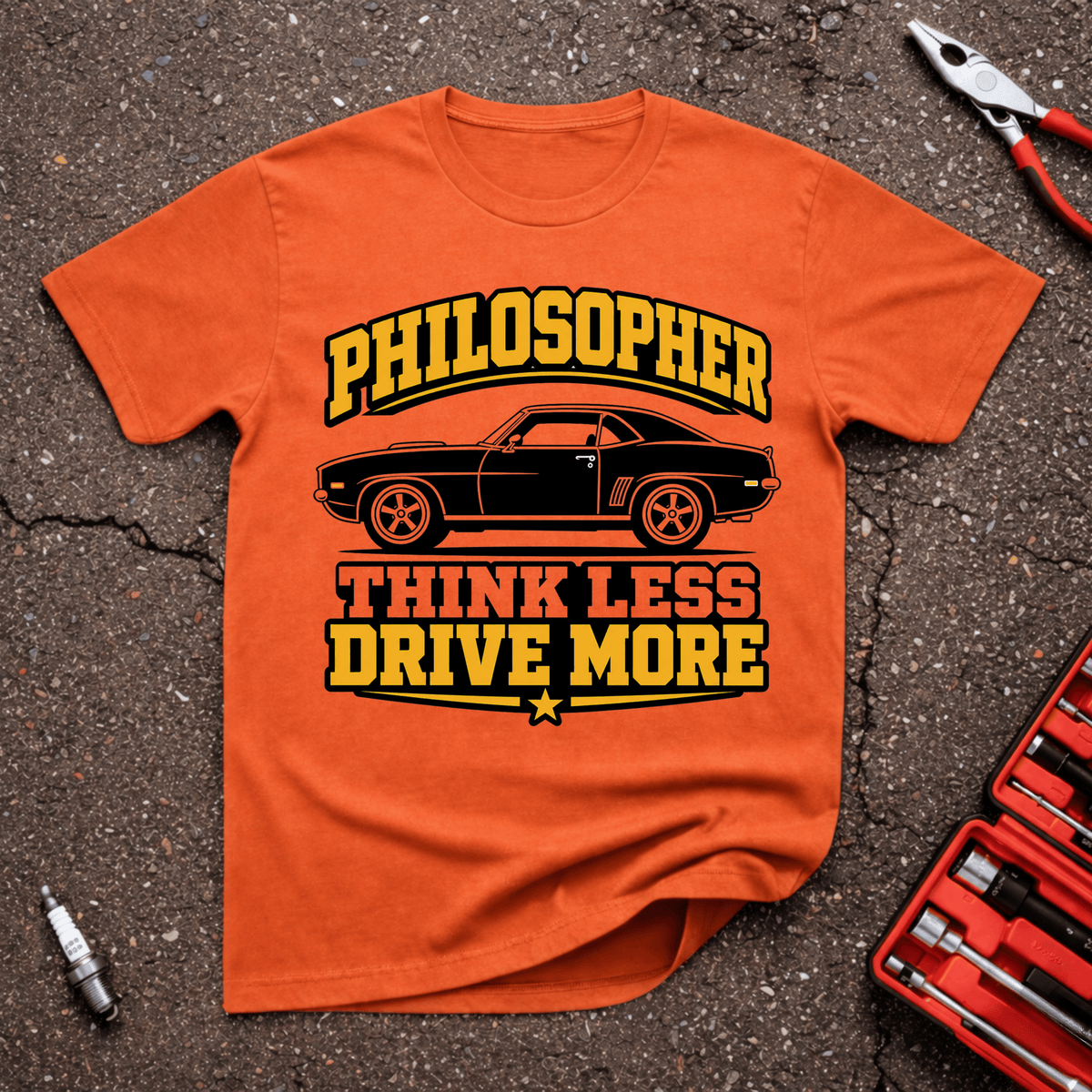 Philosopher funny automotive T-shirt with classic muscle car and text reading Philosopher Think Less Drive More on orange shirt.