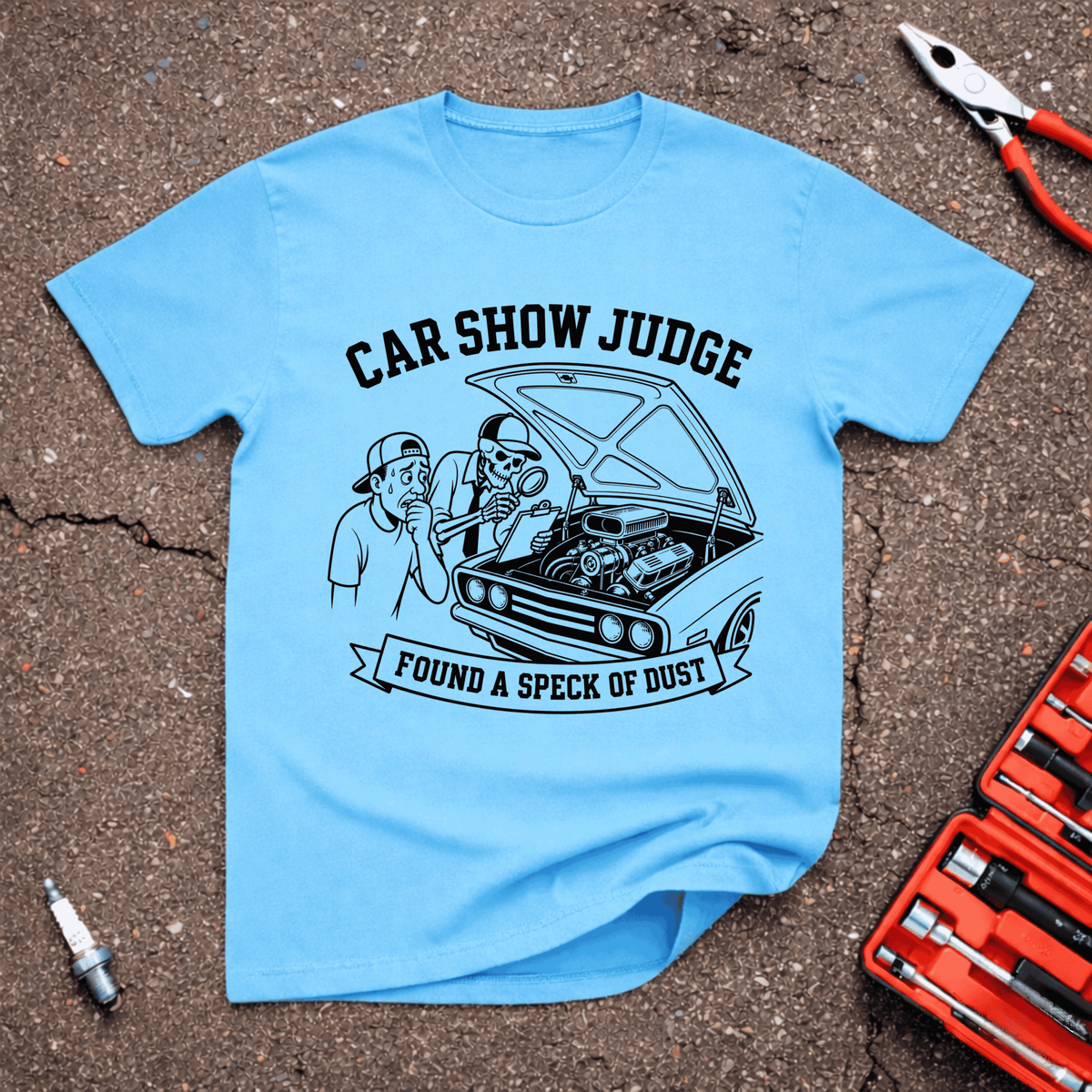 Speck Of Dust funny car show T-shirt with skeleton judge using magnifying glass over a spotless engine bay and Found A Speck Of Dust.t text on sky blue shirt